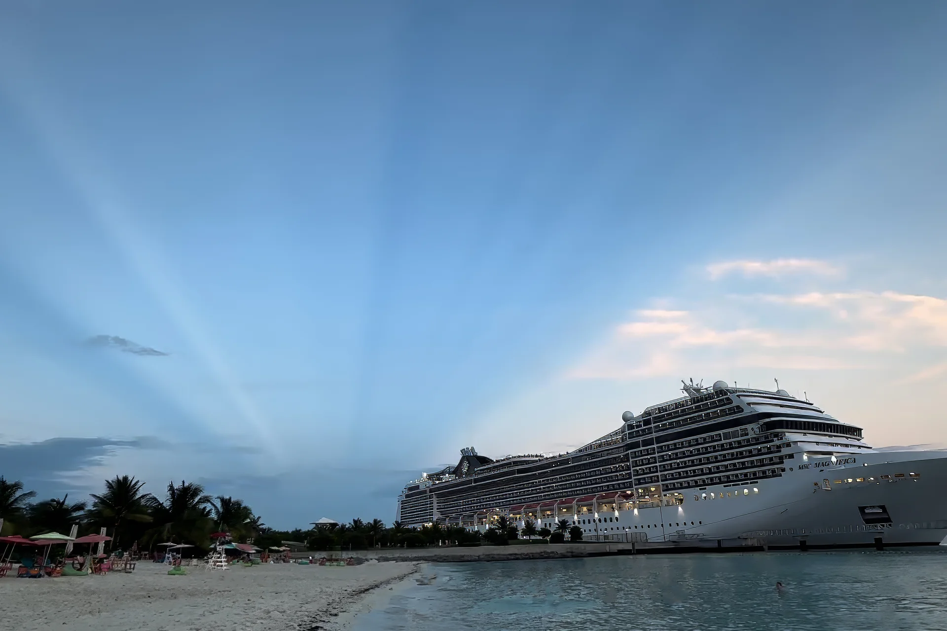 Ocean Cay beach at dusk with an MSC ship at the pier
