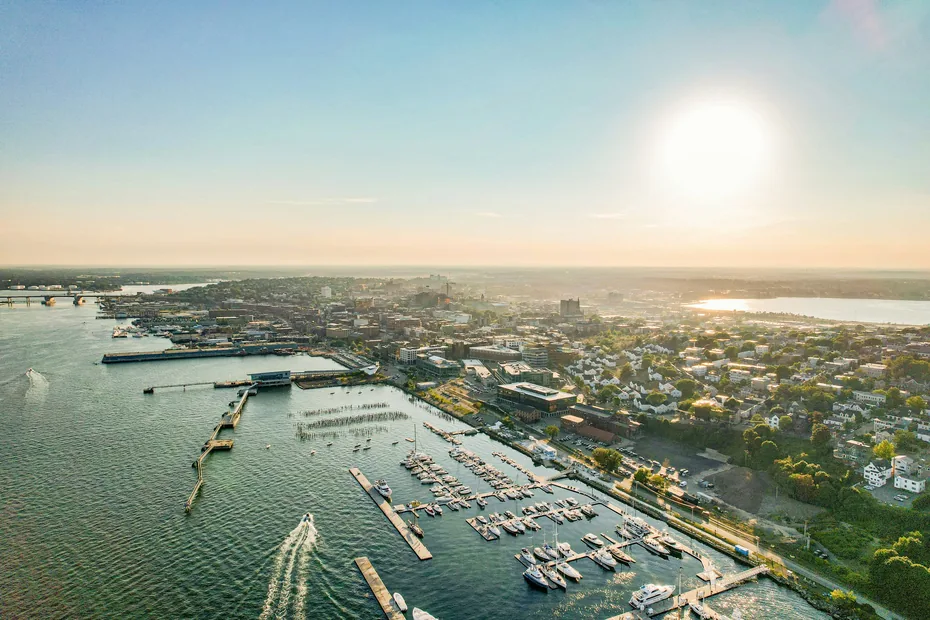 Aerial view of Portland, Maine harbor and marina at sunrise