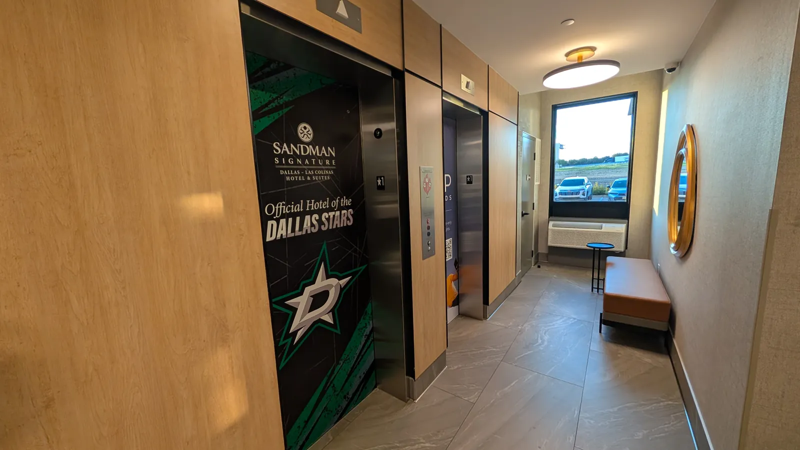 Elevator lobby with the Official Hotel of the Dallas Stars elevator wrap