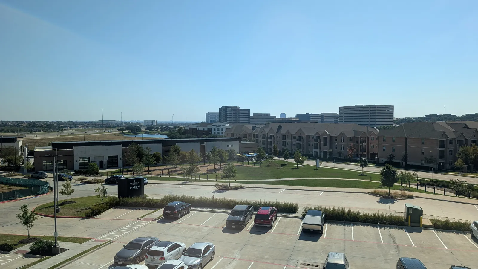View from our fourth-floor window toward apartments and the Las Colinas office towers
