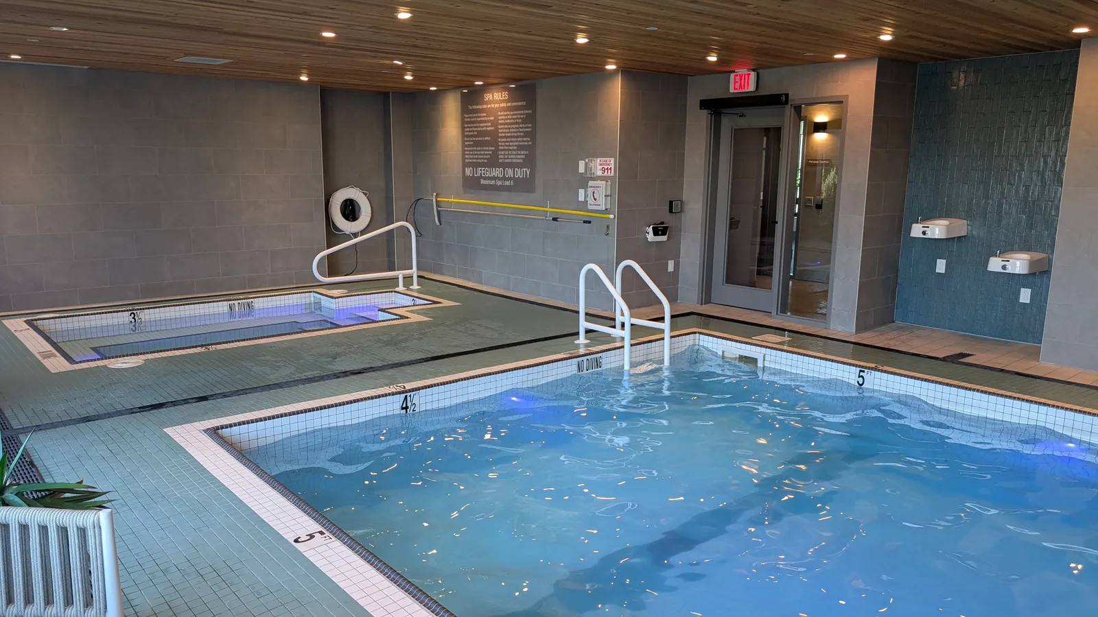 Indoor pool with the separate hot tub
