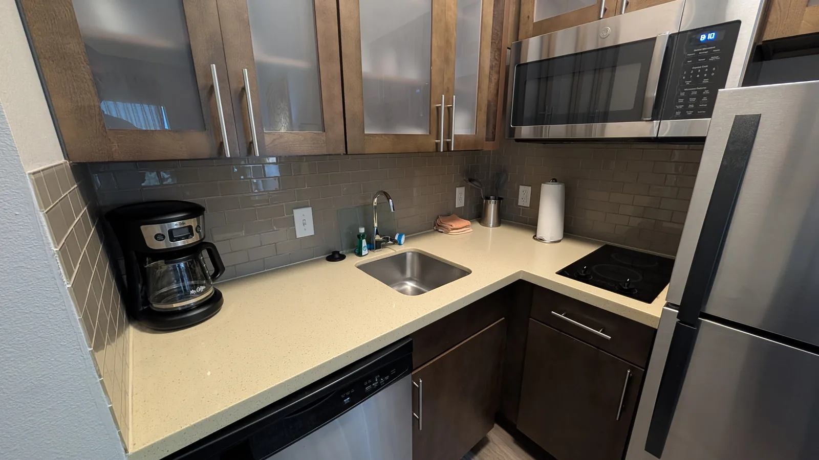 Kitchen counter and cabinets in the suite.